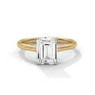 Front view of MYZA Diamonds' 2 carat emerald cut lab-grown diamond classic band ring in 18K hallmark gold. The exquisite design features a stunning lab-grown diamond, providing a sustainable and luxurious option for engagement or wedding rings.