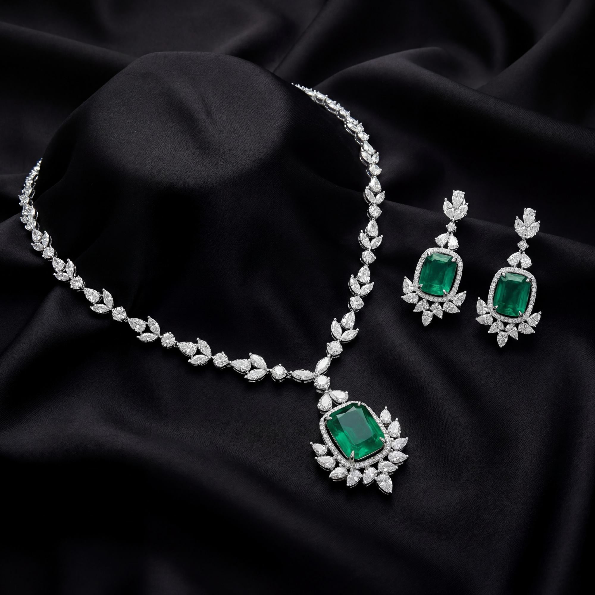 This 33 Carat MYZA set is a monumental statement of luxury, combining the soft, vintage silhouette of the cushion cut with the bold, structured clarity of the emerald cut.