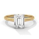 Front view of MYZA Diamonds' 5 carat emerald cut lab-grown diamond classic band ring in 18K hallmark gold. This breathtaking ring features a large, brilliant lab-grown diamond, offering a sustainable, luxurious choice for an engagement or wedding ring.