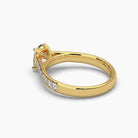 Back side view of MYZA Diamonds' 1-carat oval cut lab-grown diamond ring in 18K hallmark gold. This perspective highlights the smooth inner band, the precise setting of the oval cut diamond, and the attention to detail in the craftsmanship, offering a sustainable yet luxurious choice for engagement or wedding rings.