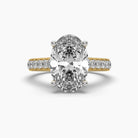 Front view of MYZA Diamonds' 4-carat oval cut lab-grown diamond ring in 18K hallmark gold. This angle highlights the impressive size and brilliance of the 4-carat oval diamond, showcasing its luxurious setting and sustainable craftsmanship, perfect for a bold engagement or wedding ring.