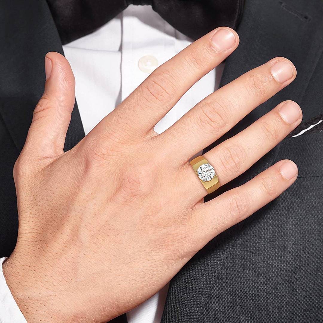 4-carat MYZA IGI certified lab-grown diamond men's ring worn on hand, featuring a sleek design in 18K hallmark gold. The eco-friendly lab-grown diamond shines brilliantly against the polished gold band, offering a perfect combination of luxury and modern masculinity. This men’s ring is an ideal choice for those seeking a timeless and sustainable jewelry piece.