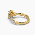 Standing top front view of MYZA Diamonds' 2-carat oval cut lab-grown diamond ring in 18K hallmark gold. This angle highlights the oval cut diamond’s brilliance and the elegant band, offering a clear view of the ring’s sustainable design and luxurious craftsmanship, ideal for engagement or wedding rings.