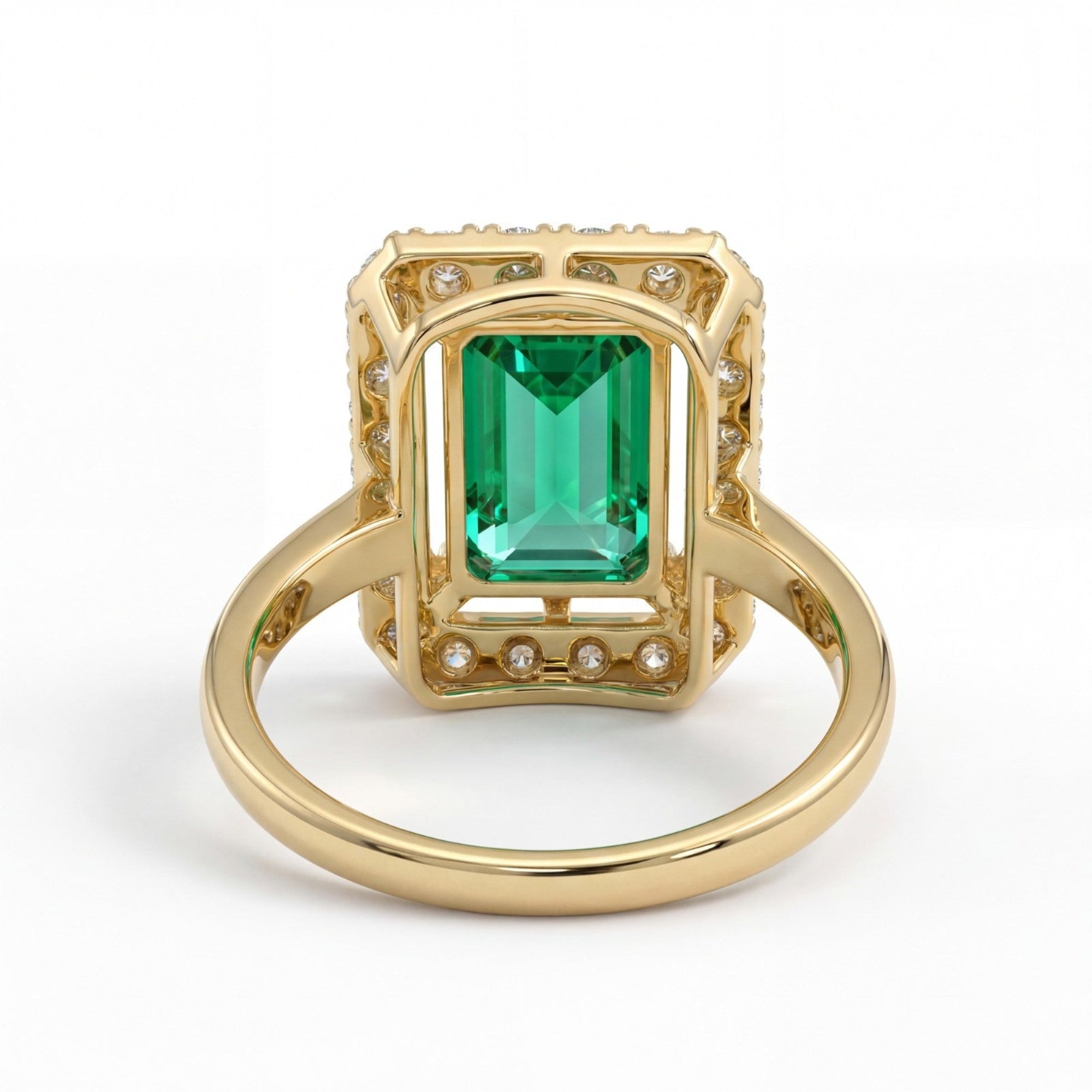 This MYZA Certified 5 Carats Emerald Cut Zambian Green Women's Ring combines a vivid, lab-grown Zambian emerald with 14K hallmarked gold and brilliant diamond accents for a bold, sustainable luxury statement.