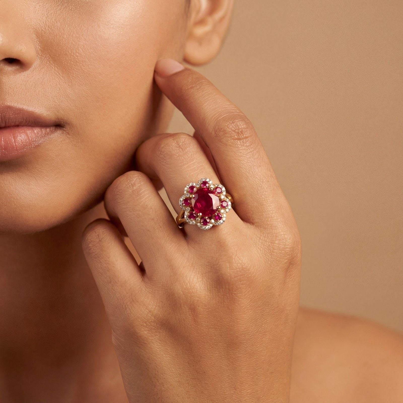 The design features a magnificent 6.6-carat oval-cut ruby surrounded by a brilliant halo of certified lab-grown diamonds, blending regal, vintage-inspired aesthetics with modern craftsmanship. Set in polished 14K hallmarked gold, the silhouette is engineered to elongate the finger while maximizing light play for a bold, high-contrast sparkle.