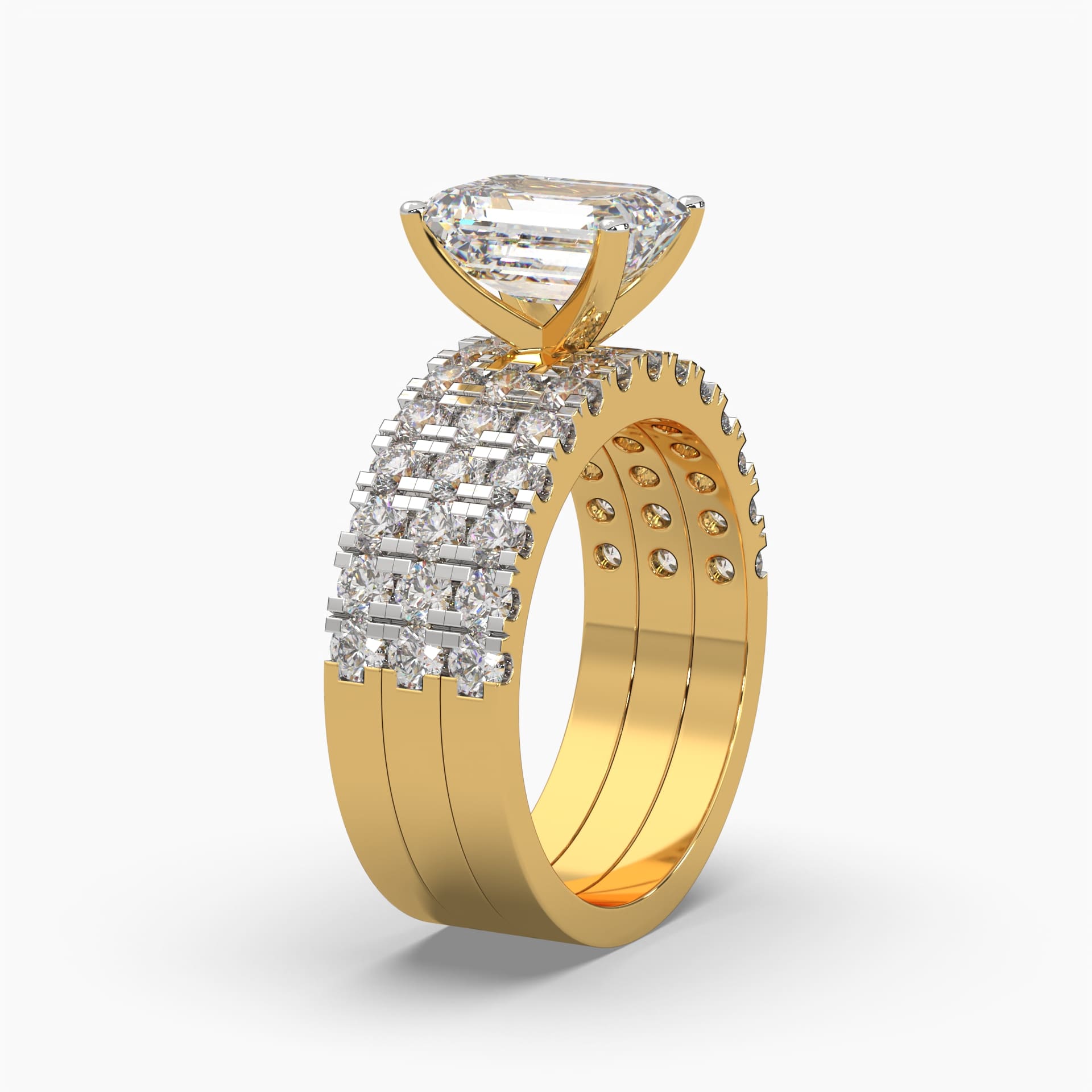 Side view of MYZA Diamonds' set of three emerald cut lab-grown diamond stacking rings in 18K hallmark gold. The design elegantly showcases each ring’s brilliant lab-grown diamond from the side, emphasizing the luxurious, sustainable craftsmanship, and the customizable stacking style perfect for engagement or special occasions.