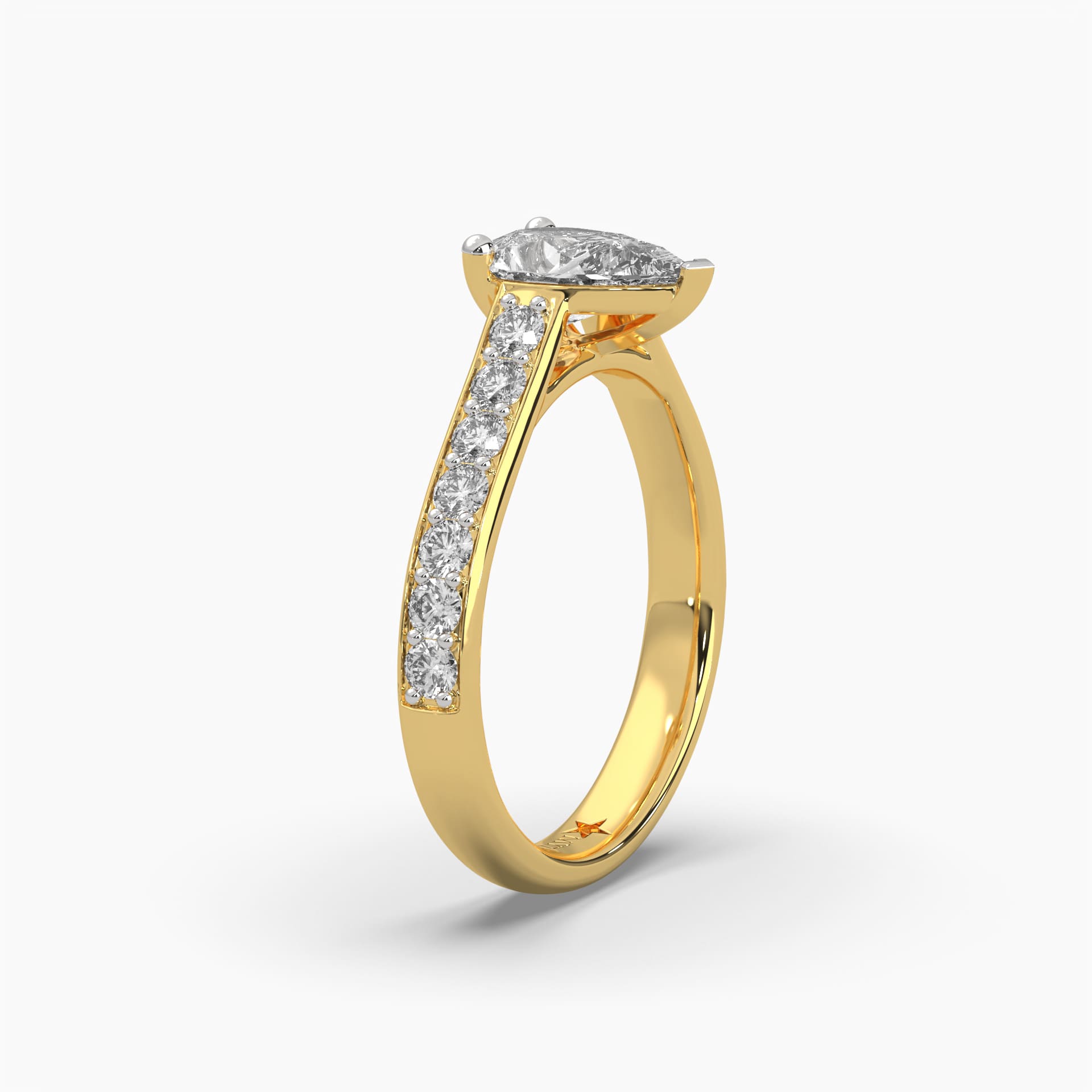 Standing side view of MYZA Diamonds' eternity band with pear cut lab-grown diamonds in 18K hallmark gold. This angle showcases the profile of each pear-shaped diamond encircling the band, emphasizing the ring’s continuous sparkle, elegant setting, and sustainable luxury craftsmanship.