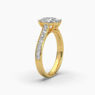 Standing view of MYZA Diamonds' 2-carat oval cut lab-grown diamond ring in 18K hallmark gold. This perspective showcases the height and brilliance of the oval cut diamond, emphasizing its elegant design and sustainable luxury, ideal for an engagement or wedding ring.