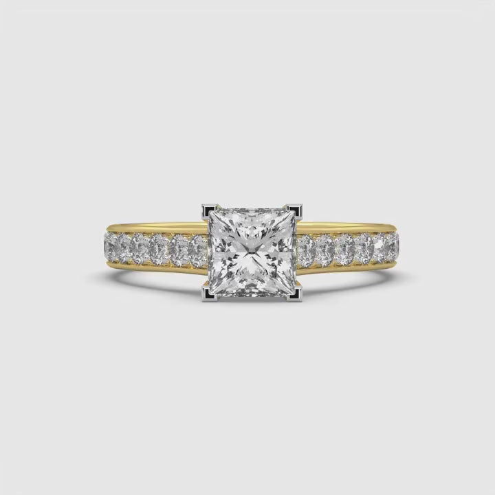 360-degree view of MYZA Diamonds' eternity band featuring princess cut lab-grown diamonds in 18K hallmark gold. This rotating video showcases the continuous arrangement of square-cut diamonds from all angles, highlighting the ring’s elegant design, brilliant sparkle, and expert craftsmanship in a luxurious and sustainable piece.