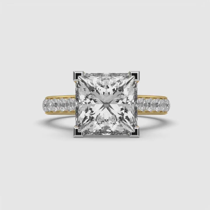 360-degree rotating video of MYZA’s 4-carat eternity band featuring princess cut lab-grown diamonds in 18K hallmark gold. This video provides a full view of the ring from all angles, showcasing the continuous sparkle of square-cut diamonds and the sustainable luxury of its elegant design.