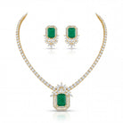 This 12 Carat MYZA high-jewelry set is an architectural triumph, blending the bold, clean lines of traditional emerald cutting with the intricate sparkle of a modern diamond medley.
