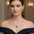 This 12 Carat MYZA high-jewelry set is an architectural triumph, blending the bold, clean lines of traditional emerald cutting with the intricate sparkle of a modern diamond medley.