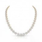 The MYZA Diamond Necklace features a design that maximizes light dispersion through a balanced arrangement of multiple diamond shapes, totaling 13 carats.