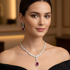 This 22 Carat MYZA set is a masterpiece of passionate color and refined geometry. By combining the deep, fiery allure of pear-cut rubies with a sophisticated mix of diamond shapes, this set creates a look of timeless majesty.