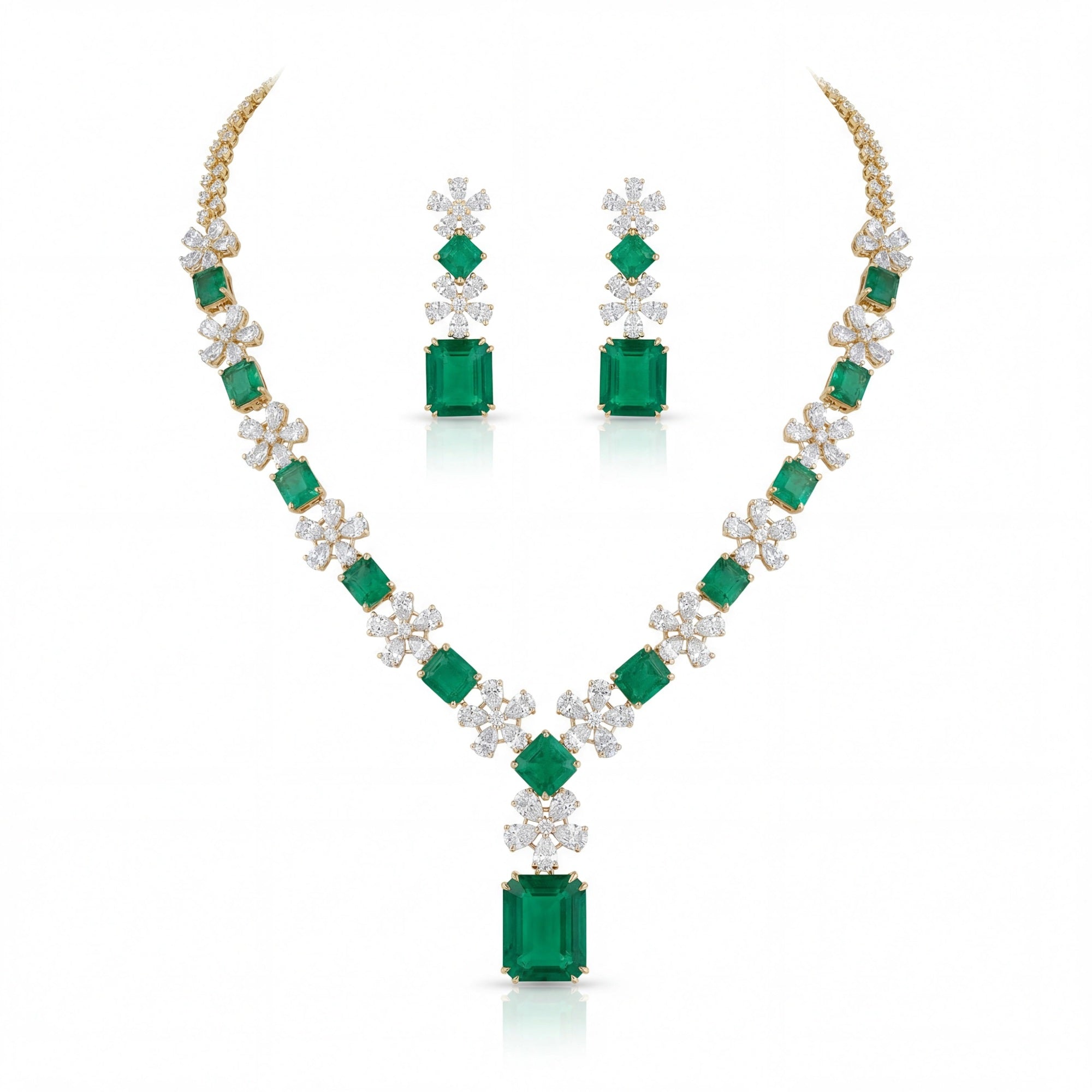 This 25 Carats MYZA set is a breathtaking masterclass in color and contrast, offering a more streamlined and contemporary take on the royal emerald aesthetic