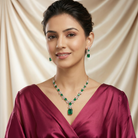 This 25 Carats MYZA set is a breathtaking masterclass in color and contrast, offering a more streamlined and contemporary take on the royal emerald aesthetic