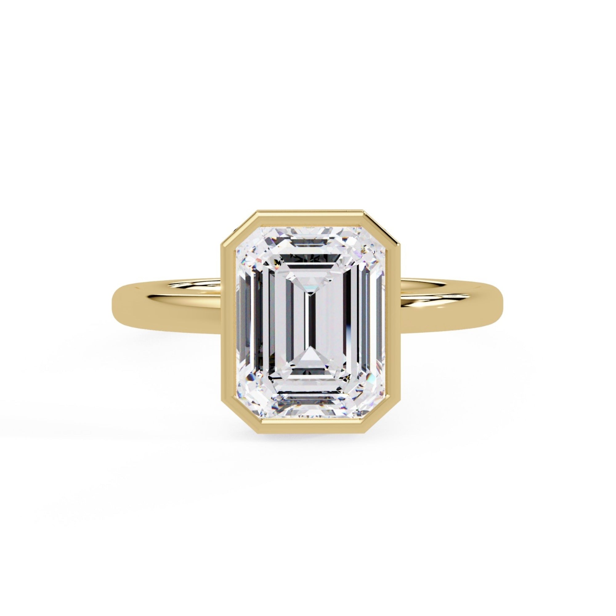 Shop MYZA's 2 carat IGI certified emerald cut lab-grown diamond bezel set engagement ring in 18K hallmarked gold. Ethical luxury, certified brilliance.