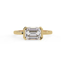 Shop MYZA 2 Carat IGI Certified Emerald Cut Lab-Grown Diamond Bezel Engagement Ring in 18K BIS Hallmarked Gold. Ethical luxury, conflict-free, made in India.