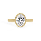 Shop MYZA 1 Carat IGI Certified Oval Cut Lab-Grown Diamond Bezel Ring in 18K Hallmarked Gold. Ethical luxury, certified brilliance. Free shipping across India.