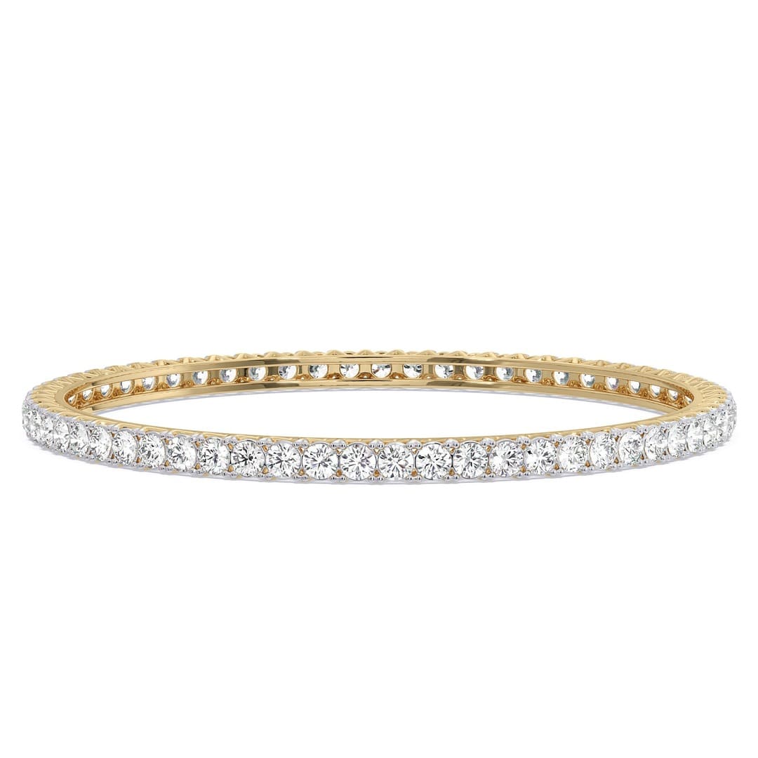 Front view of a hallmark yellow gold bangle featuring two IGI certified lab-grown diamonds, each 0.10 carats. This elegant jewelry piece is perfect for adding sparkle to any outfit.