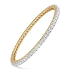 Side and front view of MYZA 0.10-carat IGI certified lab-grown diamond hallmark yellow gold bangle. Discover exquisite lab-grown diamond jewelry, certified by IGI, in stunning yellow gold designs.