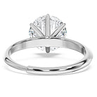 Diamond ring with a clear gemstone on a white background