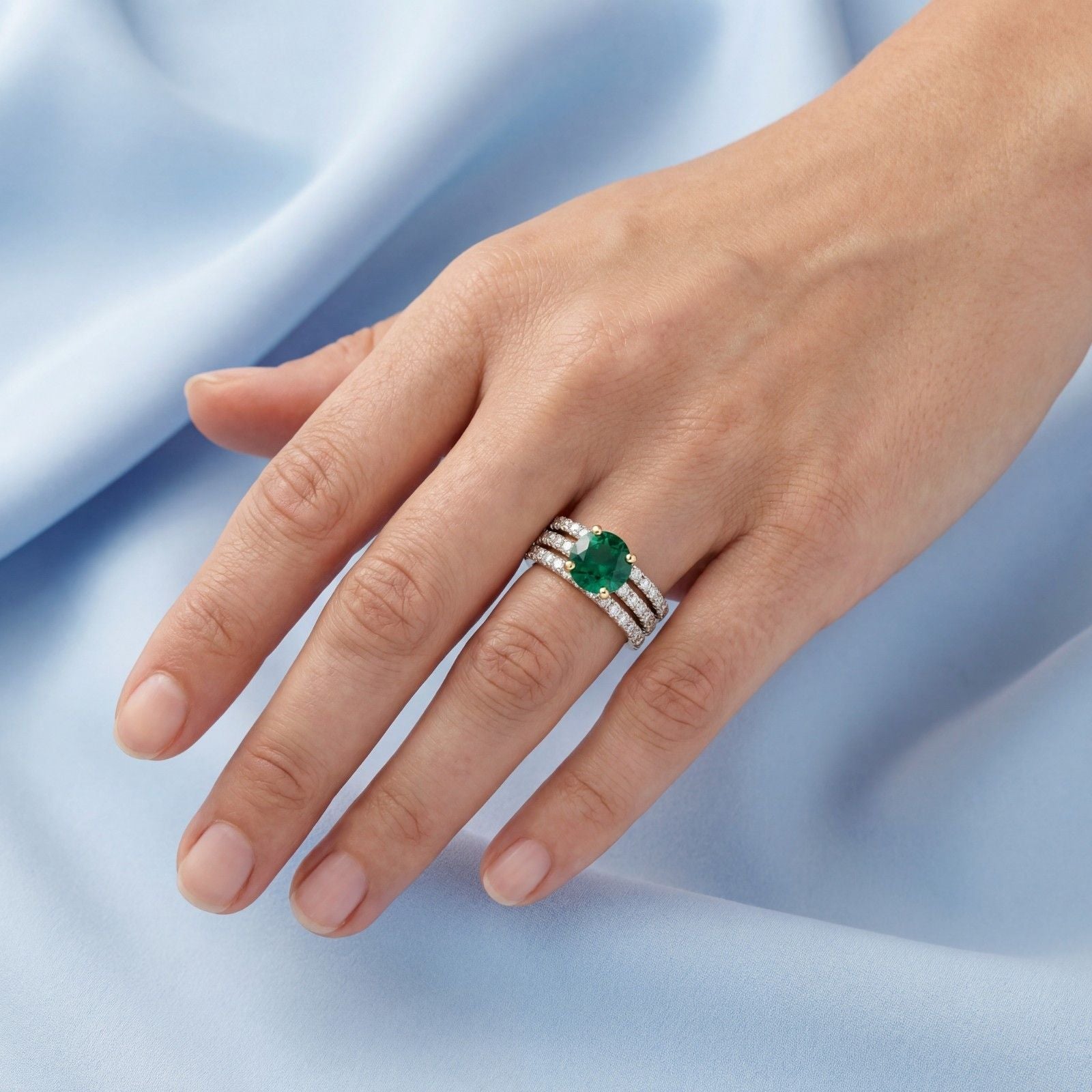 This MYZA Certified 11.2 Carats Round Cut Zambian Green Women's ring features a brilliant lab-grown Zambian emerald set in premium 18K hallmarked gold, blending the classic fire of a round brilliant cut with the rich, ethical luxury of vivid green gemstones.