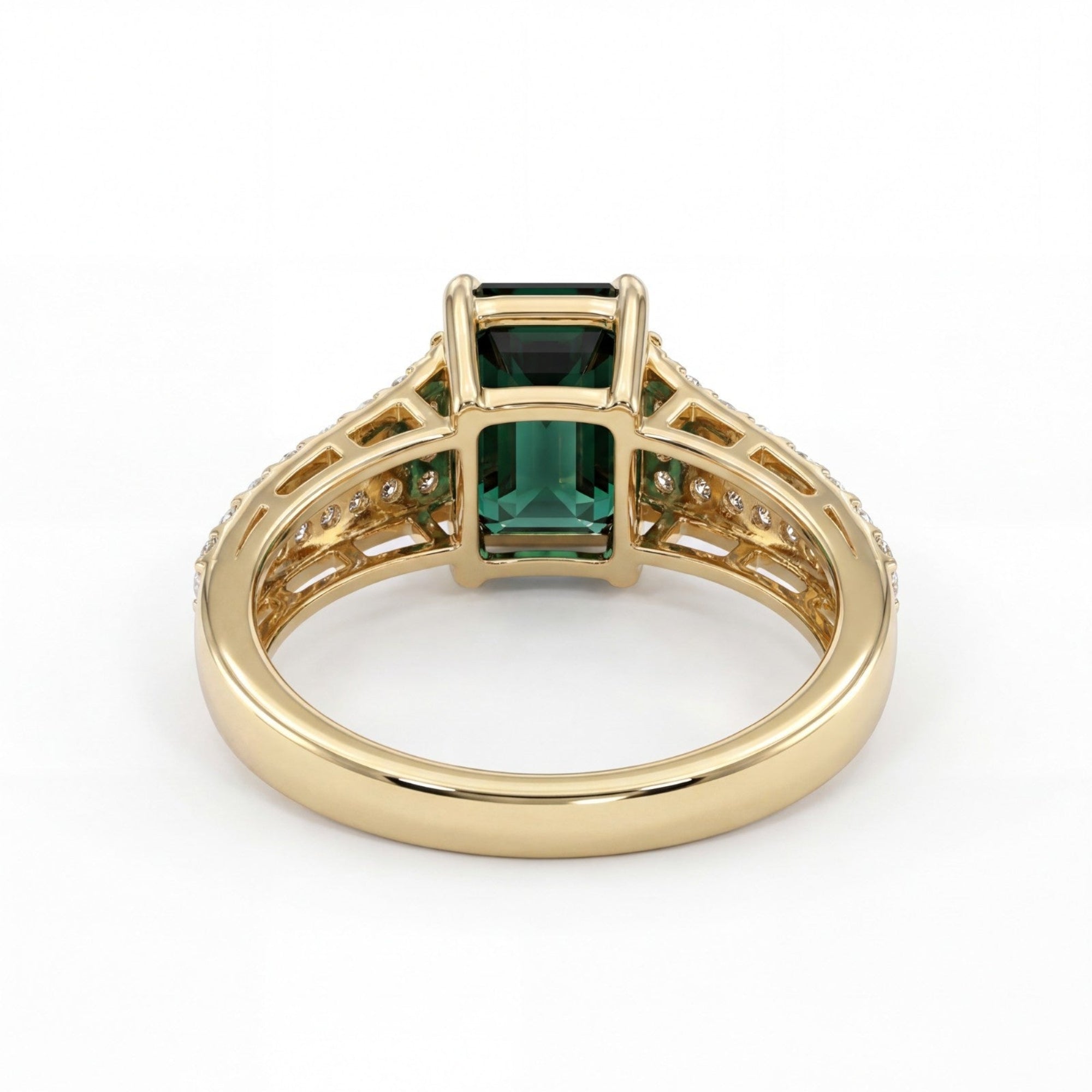 This MYZA Certified 1.5 Carats Emerald Cut Zambian Green Women's Ring  features a vivid lab-grown Zambian emerald in a 14K hallmarked gold setting, offering a sleek, sophisticated balance of classic step-cut elegance and brilliant diamond accents.