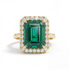 This MYZA Certified 5 Carats Emerald Cut Zambian Green Women's Ring combines a vivid, lab-grown Zambian emerald with 14K hallmarked gold and brilliant diamond accents for a bold, sustainable luxury statement.