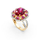 The design features a magnificent 6.6-carat oval-cut ruby surrounded by a brilliant halo of certified lab-grown diamonds, blending regal, vintage-inspired aesthetics with modern craftsmanship. Set in polished 14K hallmarked gold, the silhouette is engineered to elongate the finger while maximizing light play for a bold, high-contrast sparkle.
