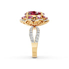The design features a magnificent 6.6-carat oval-cut ruby surrounded by a brilliant halo of certified lab-grown diamonds, blending regal, vintage-inspired aesthetics with modern craftsmanship. Set in polished 14K hallmarked gold, the silhouette is engineered to elongate the finger while maximizing light play for a bold, high-contrast sparkle.
