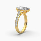 Side standing view of MYZA Diamonds' 4-carat eternity band with pear cut lab-grown diamonds in 18K hallmark gold. This angle highlights the elegant profile of the band and the continuous line of pear-shaped diamonds, showcasing the luxurious craftsmanship and brilliant sparkle from the side, ideal for special occasions or engagements.