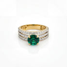This MYZA Certified 11.2 Carats Round Cut Zambian Green Women's ring features a brilliant lab-grown Zambian emerald set in premium 18K hallmarked gold, blending the classic fire of a round brilliant cut with the rich, ethical luxury of vivid green gemstones.