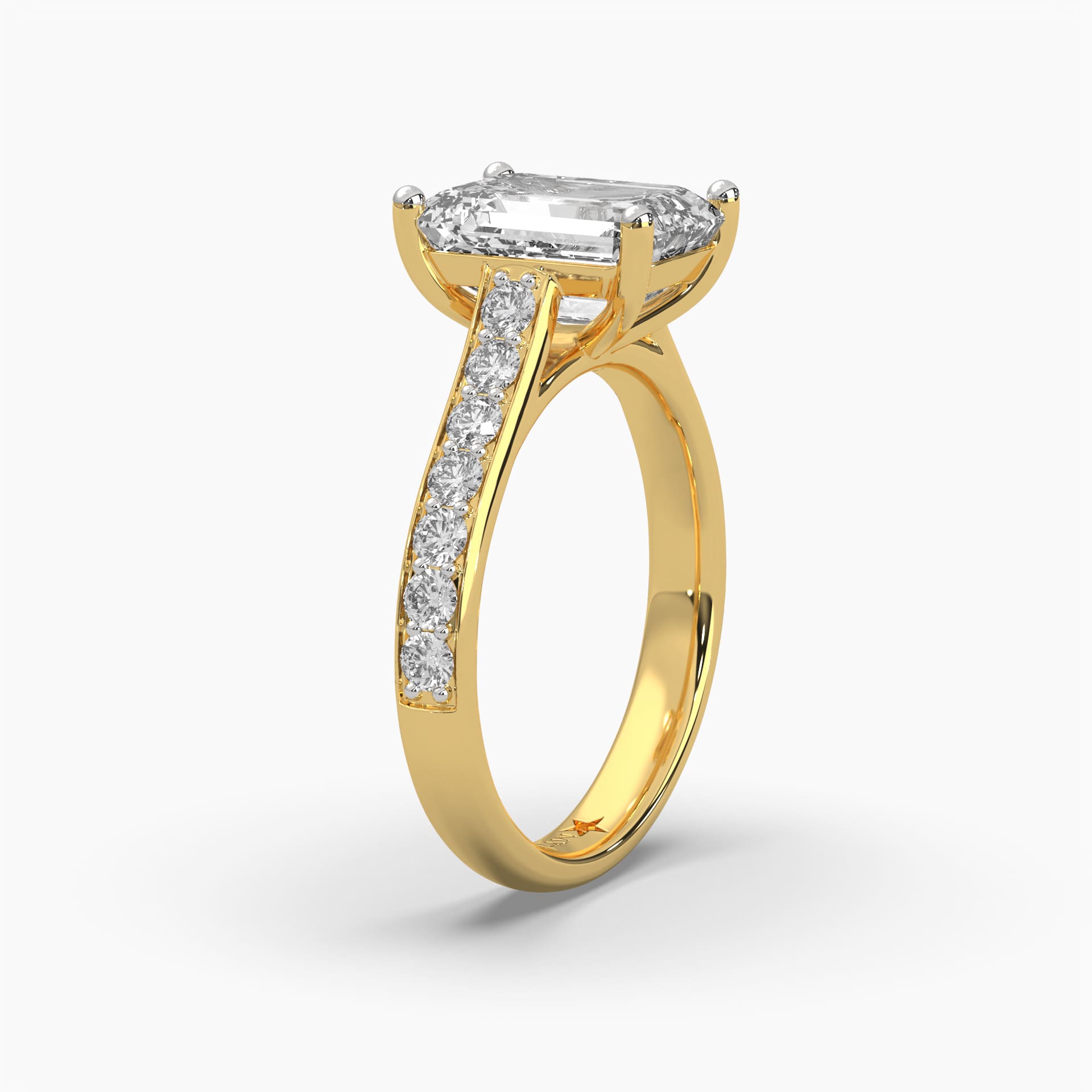 Top side view of MYZA Diamonds' 3-carat eternity band emerald cut lab-grown diamond ring in 18K hallmark gold. This angle highlights the continuous row of sparkling emerald cut diamonds, capturing the brilliance and sophistication of the design, ideal for an engagement or wedding ring with sustainable luxury.