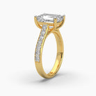 Top side view of MYZA Diamonds' 5-carat eternity band emerald cut lab-grown diamond ring in 18K hallmark gold. This angle highlights the continuous row of emerald cut diamonds across the band, showcasing their brilliance and the sleek, elegant design, ideal for engagement or wedding rings with sustainable luxury.