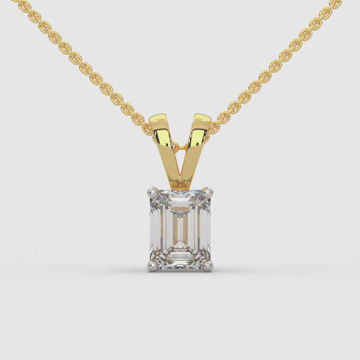 360-degree rotating view of an emerald cut lab grown diamond pendant with a gold chain, showcasing the pendant’s solitaire design and intricate setting from every angle. Luxury and sustainable jewelry by MYZA Diamonds, offering a complete view for an immersive shopping experience.